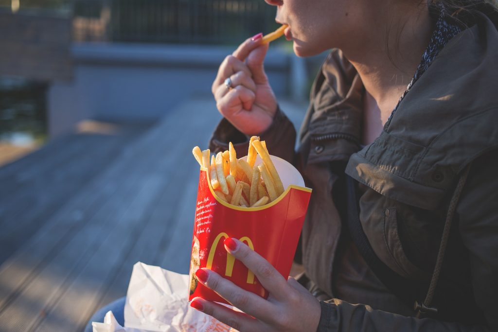 person eating mcdonalds