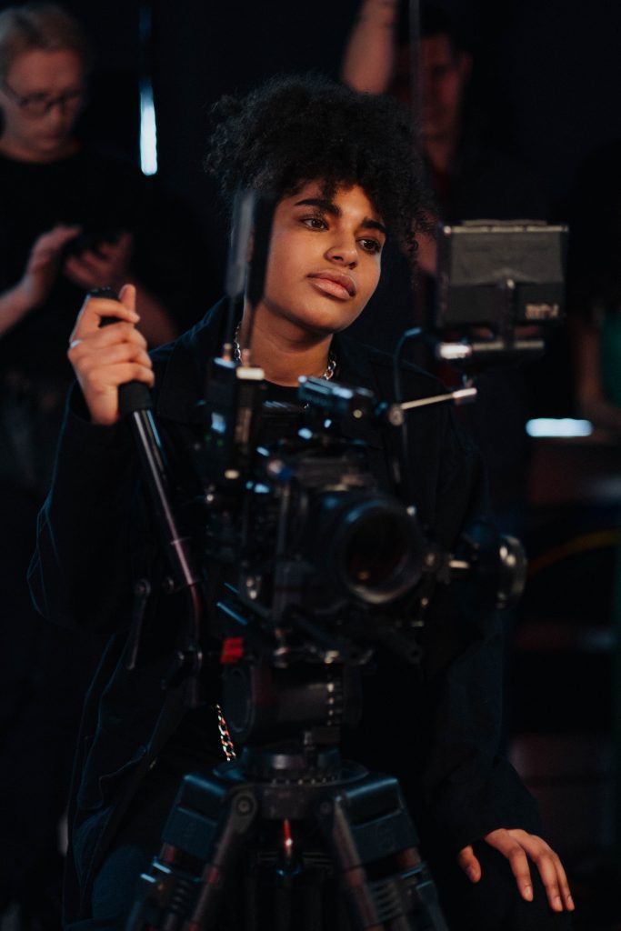person directing a camera