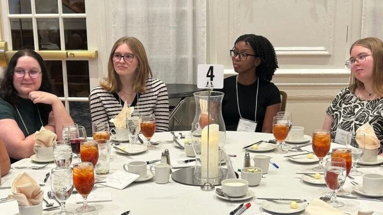 Attendees of the 2025 Naylor Workshop listen to a speaker.