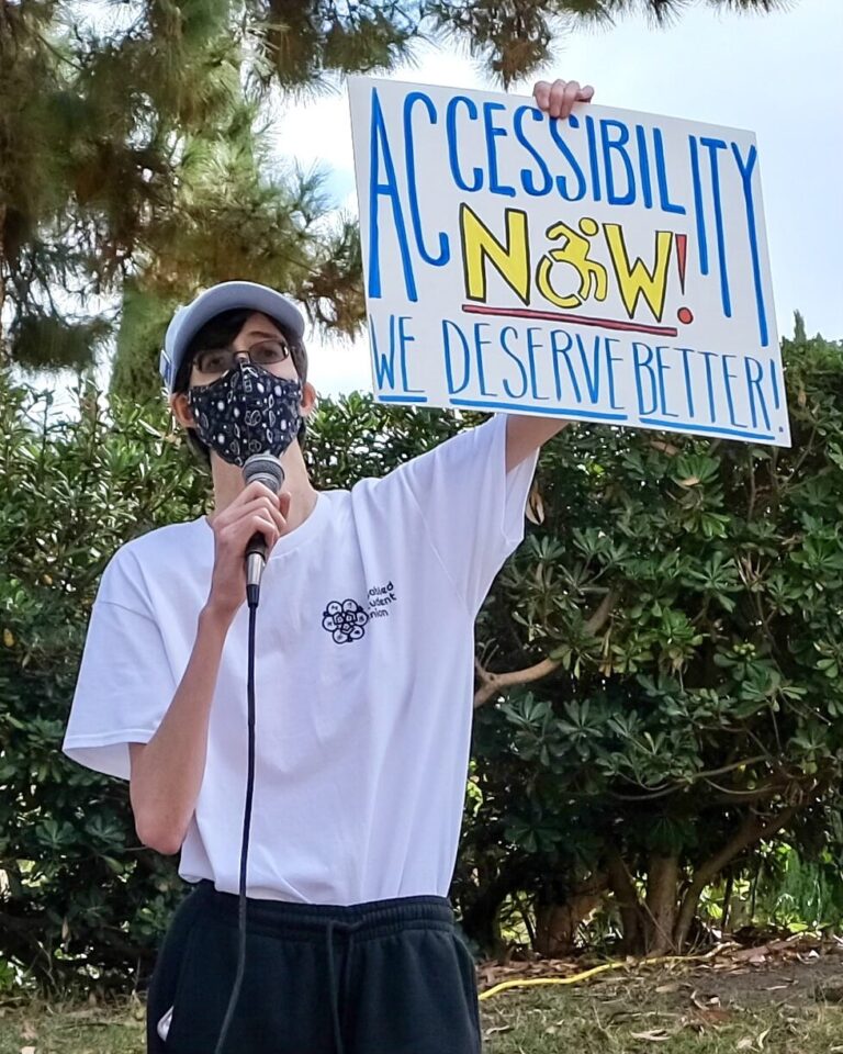 Protest photo from 2021 at UCLA, Christopher pictured